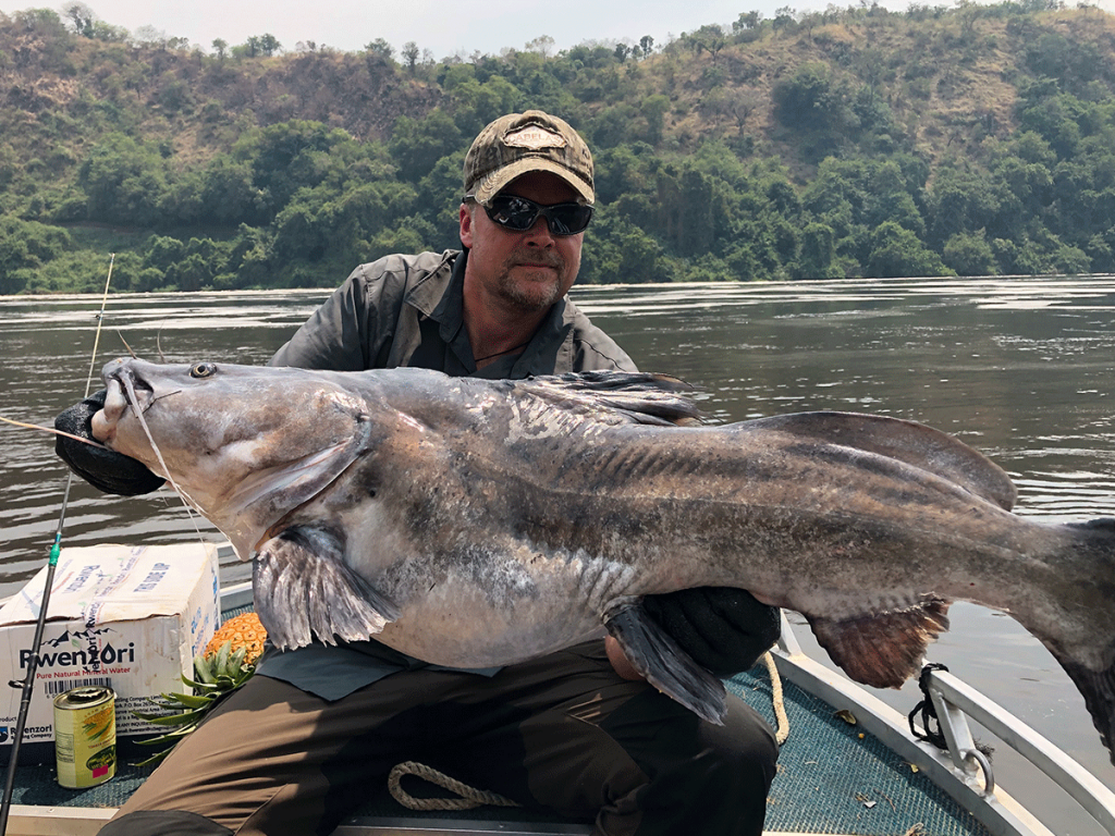 Cat fish fishing on the Nile in Murchison Falls NP
